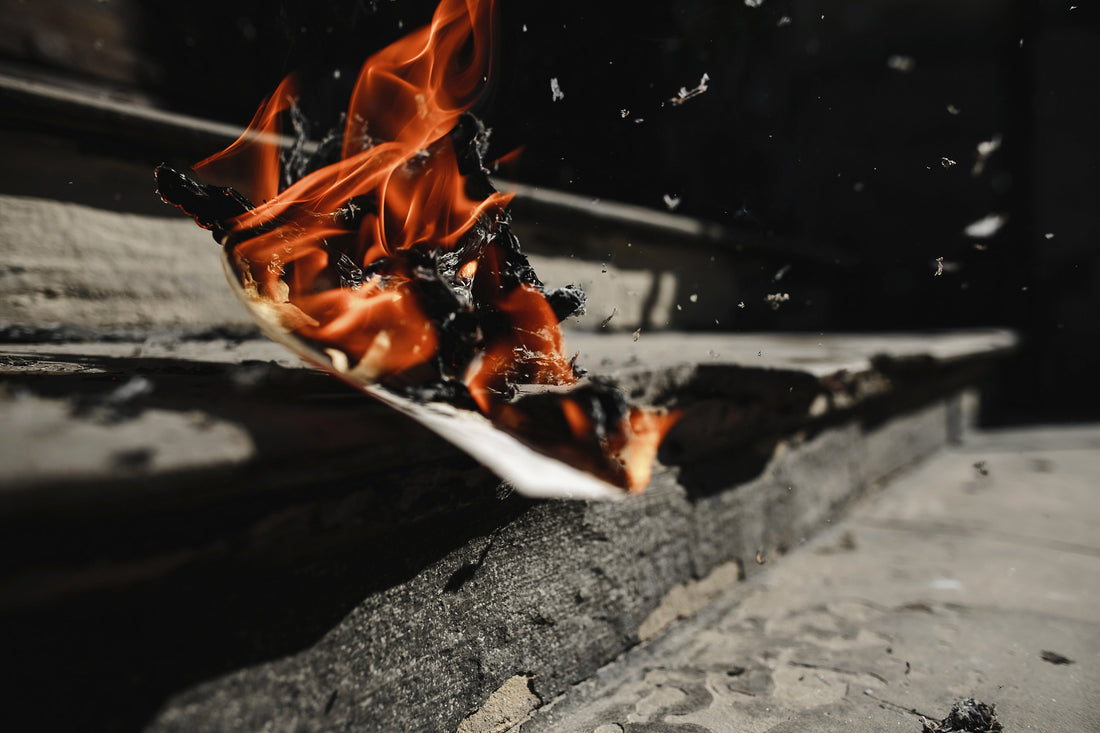Can I burn paper in a wood stove?